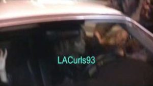 Taryn Manning indications for fans in her car at Voyeur nightclub